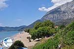 beach Kampos (Votsalakia) with daarachter the Kerkis-gebergte - Island of Samos - Photo GreeceGuide.co.uk