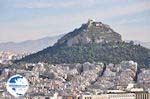 The Lykavitos hill with on the top the witte kerk - Photo GreeceGuide.co.uk