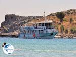 Boat in bay of Lindos - Photo GreeceGuide.co.uk