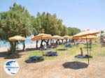 Parasols at beach Doreta Beach - Island of Rhodes - Photo GreeceGuide.co.uk
