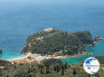 View Paleokastritsa - Op the top of the berg the klooster - Photo GreeceGuide.co.uk