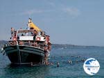 Een duikje nemen in Kalami (Corfu) - Photo GreeceGuide.co.uk