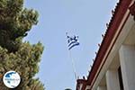 Greek flag Bourtzi Skiathos-stad - Photo GreeceGuide.co.uk