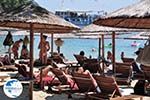 Ligstoelen and parasols beach Koukounaries - Skiathos - Photo GreeceGuide.co.uk